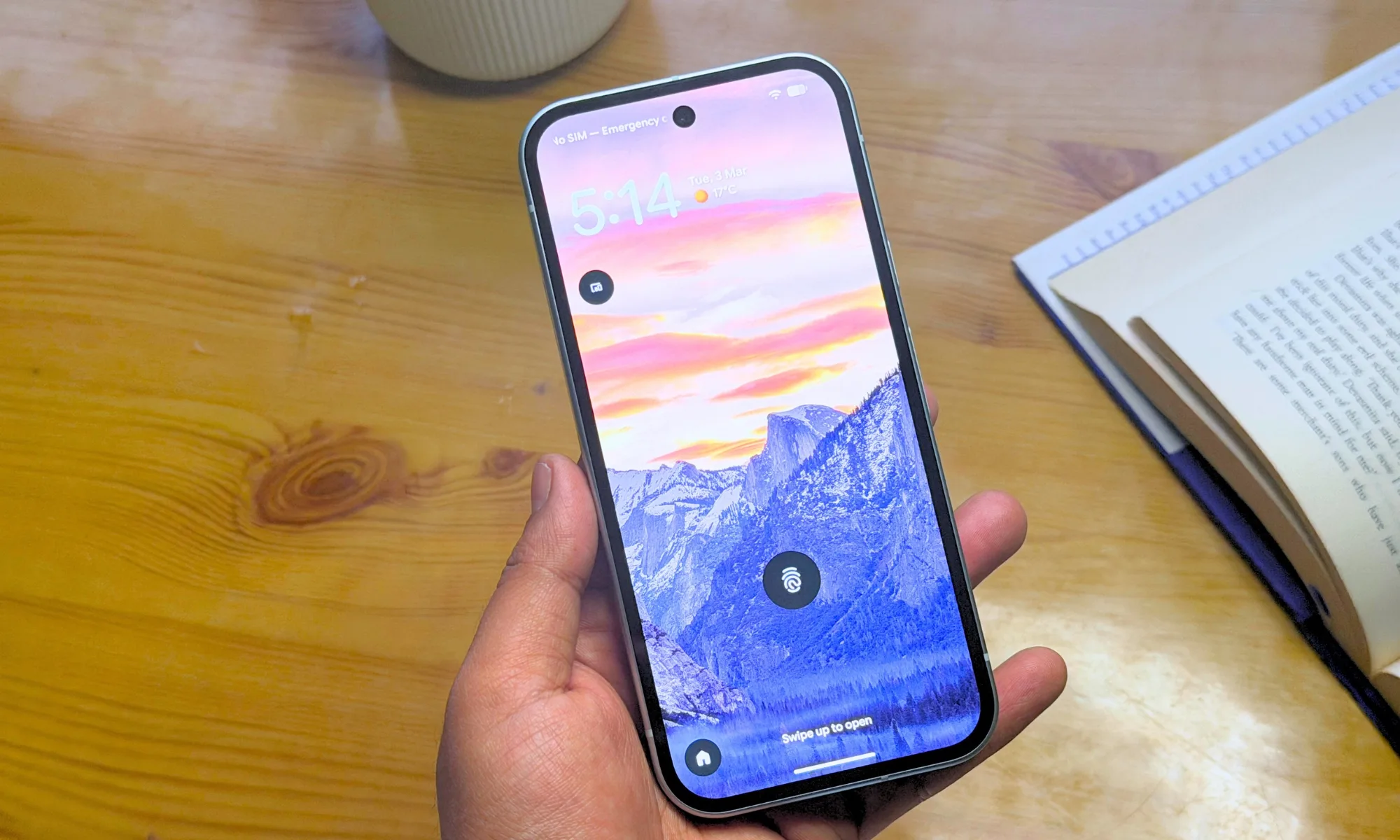 Google Pixel 10a in hand.