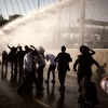 Police use water cannon to disperse ultra-Orthodox Jewish men blocking a street during a protest against the country's military draft in Jerusalem, April 29.