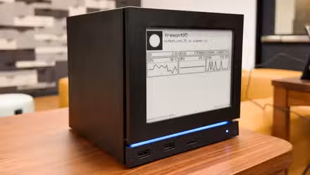 A photo of Valve's Steam machine with an e-ink display
