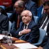 Palestinian Ambassador to the United Nations Riyad Mansour pats his heart during the Kuwait crown prince's address at the High-Level Security Council meeting on Palestinians and Israel during the 80th session of the United Nations General Assembly, Sept. 23, 2025.