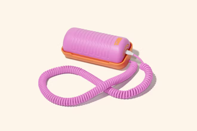 pink and orange landline phone from the brand tin can