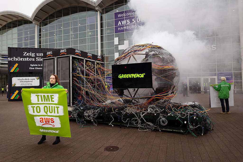 Protest with Sculpture and Banner against Amazon´s Cloud Provider Protest with Sculpture and Banner against Amazon´s Cloud Provider