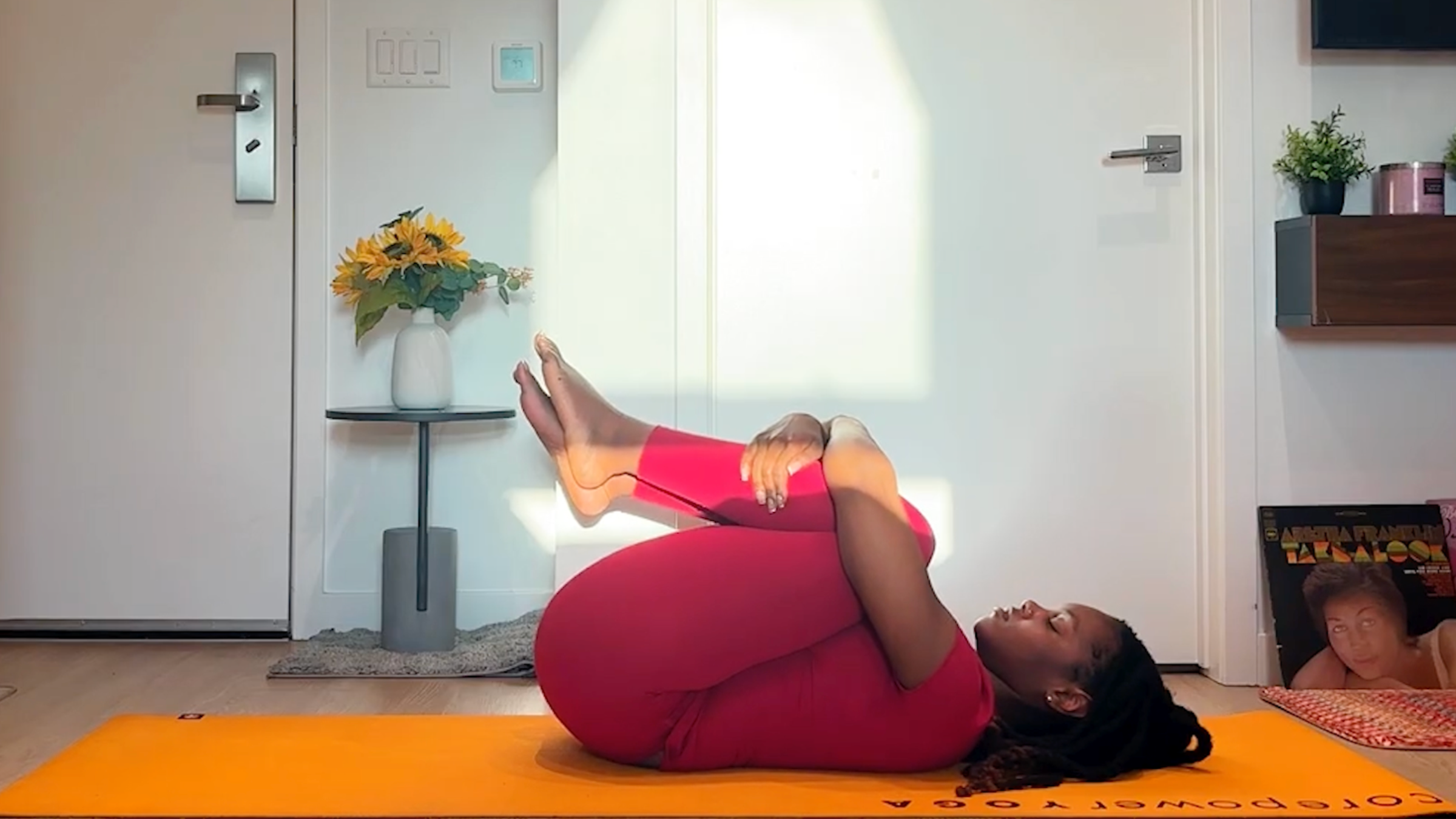 Ramoni Overton practicing knees to chest.