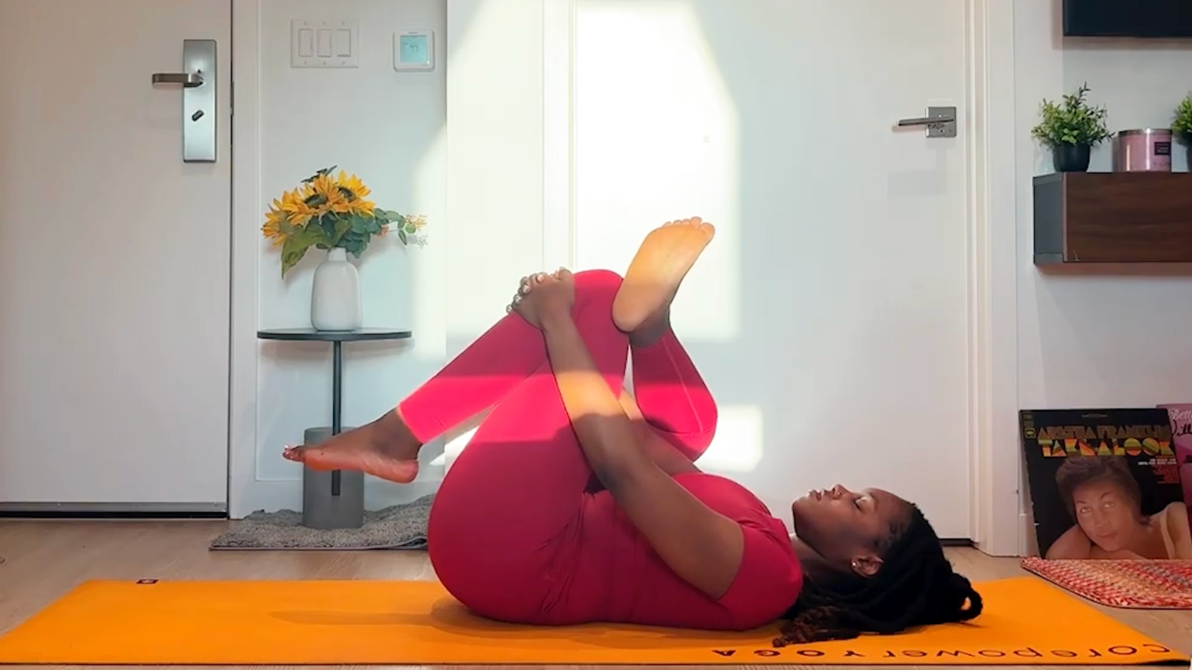 Ramoni Overton practicing figure 4 stretch.