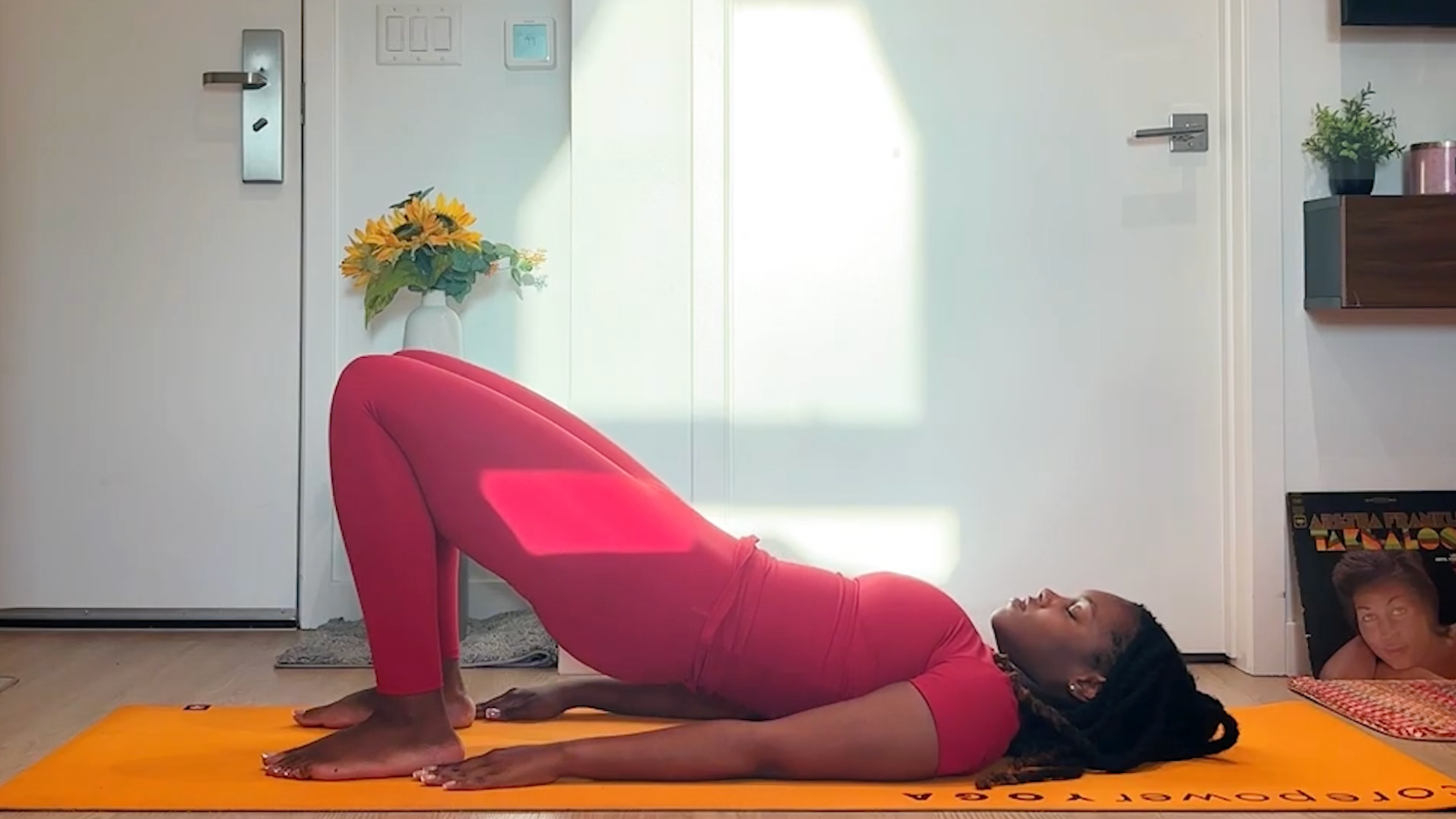 Ramoni Overton practicing Bridge Pose.