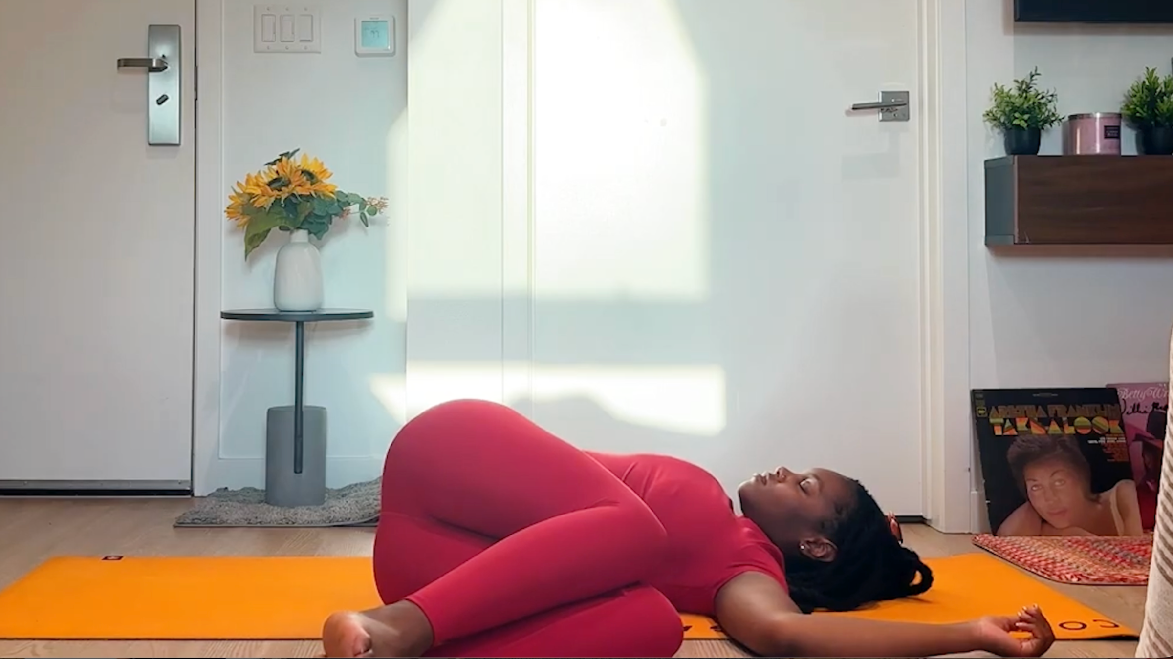 Ramoni Overton Practicing supine spinal twist.