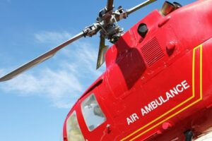Air ambulance and health care by Contributor Davide Zanin Photography shutterstock_1353415289-min closeup of air ambulance - a red helicopter