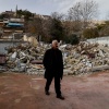 Fakhri Abu Diab, a community leader, walks by the remains of his family home, after it was destroyed by Israeli forces, in the Silwan neighborhood of East Jerusalem.