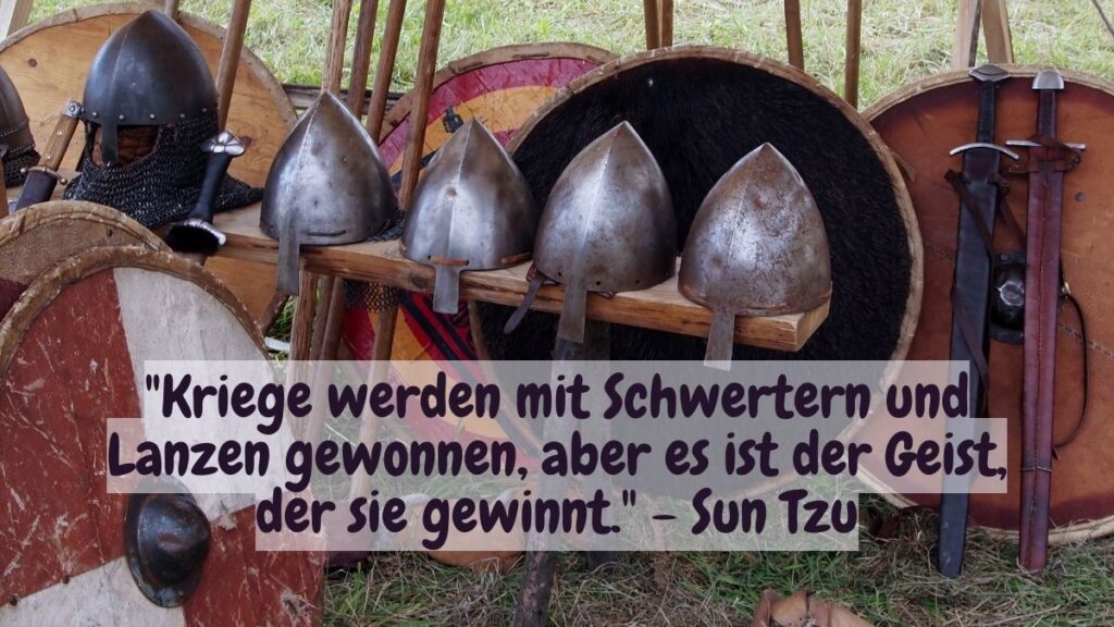 Helme, Schutzschilde und Schwerter. Zitat: "Kriege werden mit Schwertern und Lanzen gewonnen, aber es ist der Geist, der sie gewinnt." - Sun Tzu