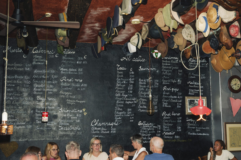 The ceiling at Osteria al Cappello makes more sense if you know that cappello means hat.