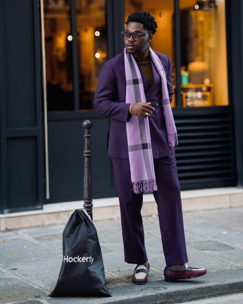 purple suit with olive turtleneck and lilac scarf 2024 11 27 16 32 31